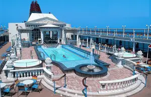 Large cruise ship deck with swimming pool and lounge area, cruise ship accident legal representation.
