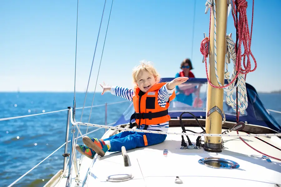 kids sail on yacht in sea. child sailing on boat. little boy in