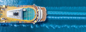 aerial view of beautiful white cruise ship above luxury cruise c