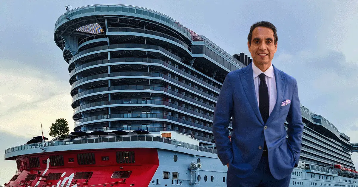 Carnival Magic cruise ship sailing in open water with a play button overlay, representing maritime travel and leisure.