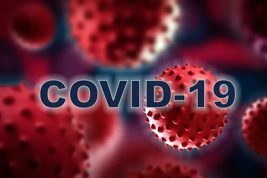 COVID-19 virus particles in red and black background, representing pandemic impact on cruise lines and travel safety.