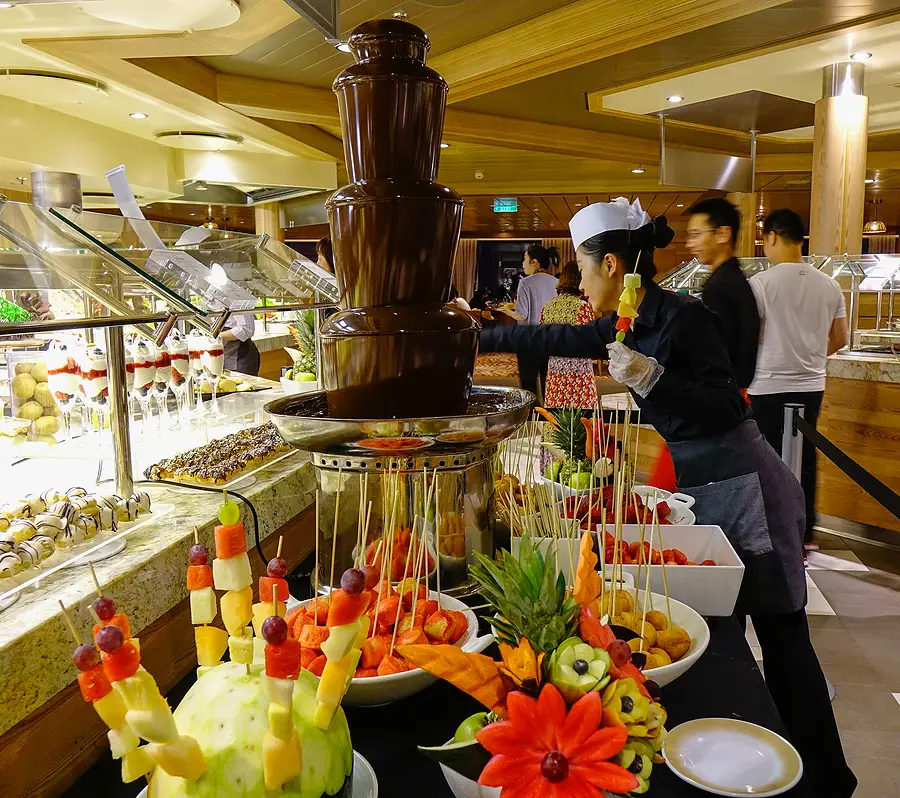 shanghai, china jun 3, 2019. chocolate fountain with fresh fru
