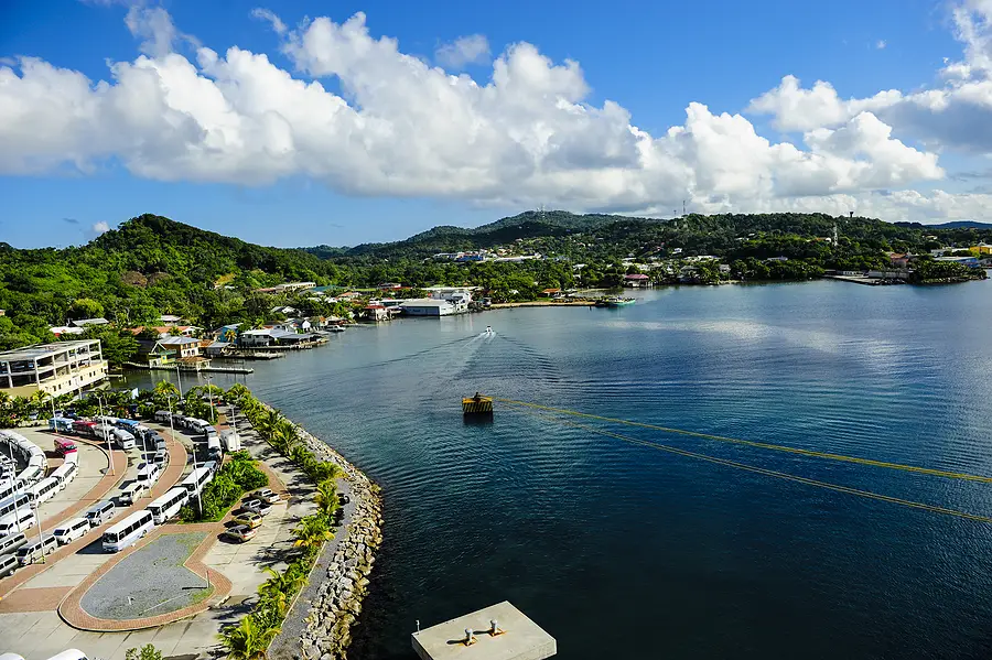 Coastal view of Roatan, Honduras, cruise ship docked and excursion activities